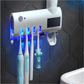 Aplicador de pasta de dente com suporte e dispensador automático de escovas de dente com esterilizador UV.